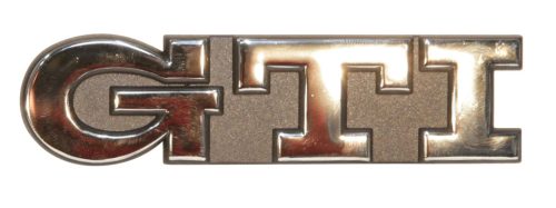 Rear emblem - GTI lettering chrome text on black background: Golf Mk2 (1984-1987), Golf Mk3 (1992-1998)